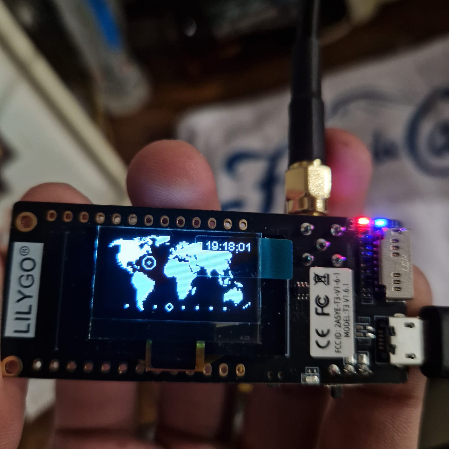 Iridescent ripples of a bright blue and pink liquid